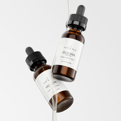 Two Leaf & Bird Gua Sha Face Oil amber dropper bottles