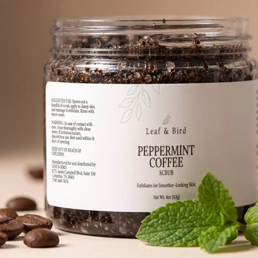 Close-up of the Peppermint Coffee Scrub jar showing coffee grounds and sugar through the clear jar