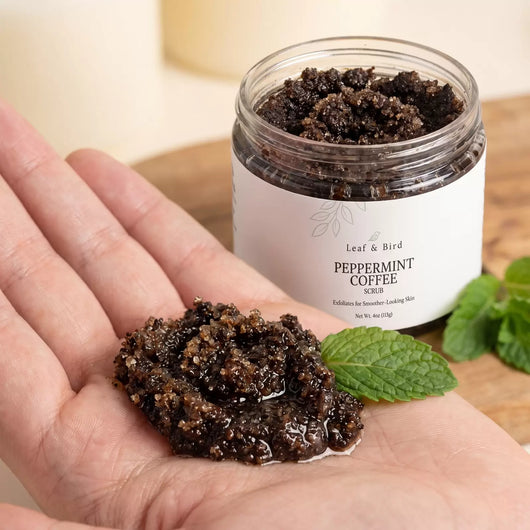 Peppermint Coffee Scrub texture: coffee grounds and brown sugar in an open palm